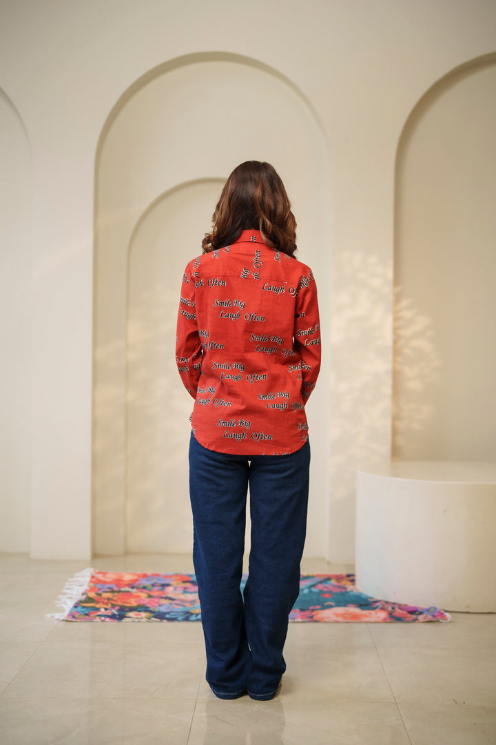 Red "smile big laugh often" cotton shirt