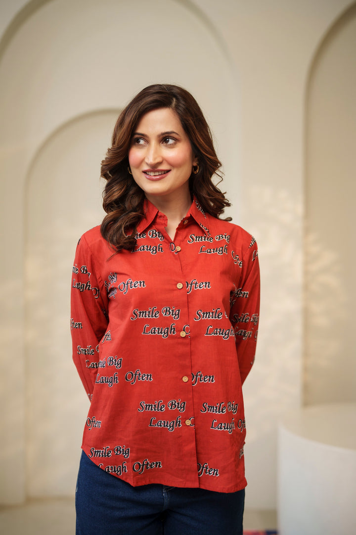 Red "smile big laugh often" cotton shirt