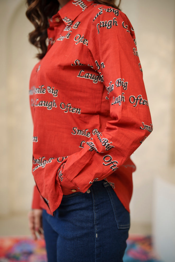 Red "smile big laugh often" cotton shirt