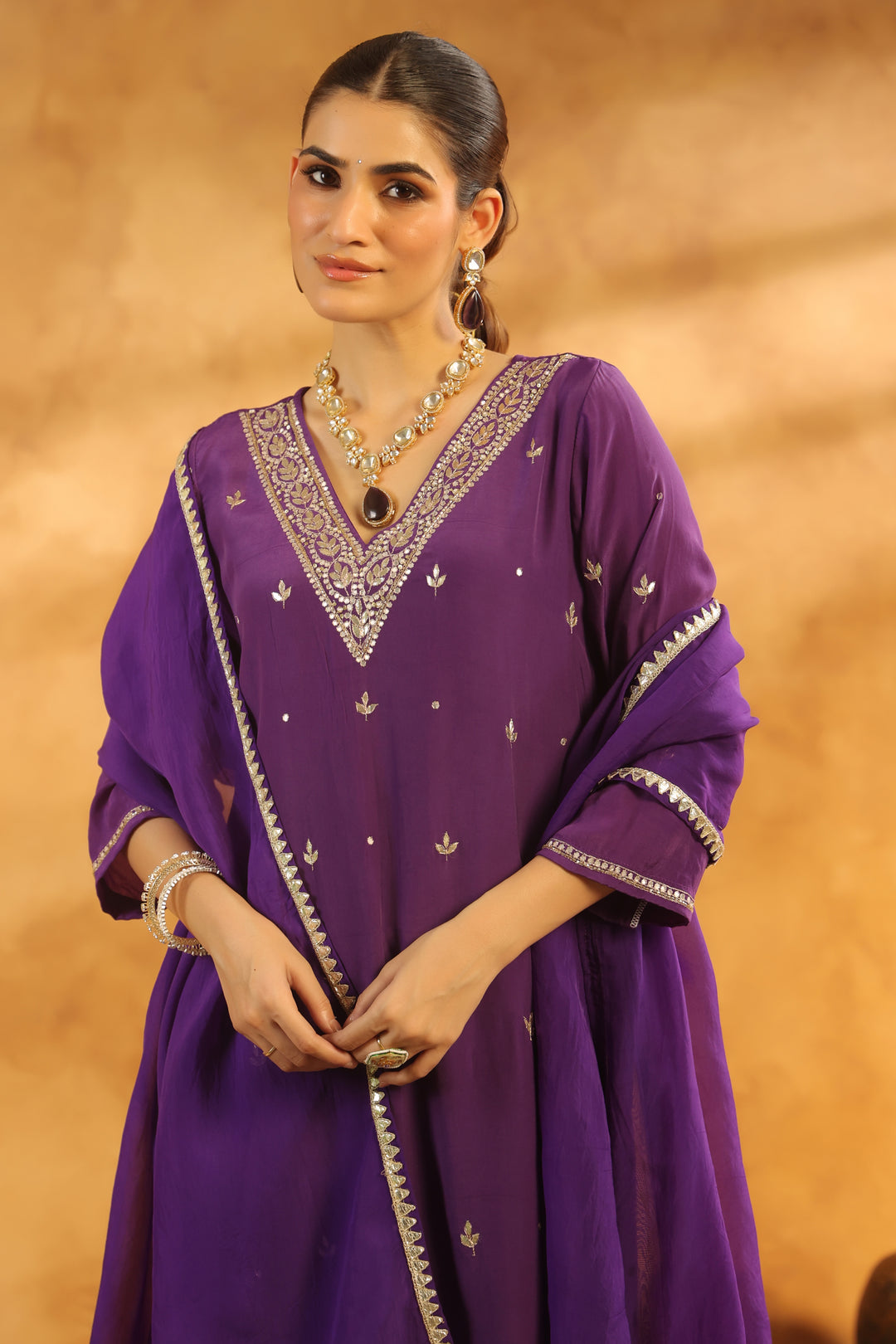 Sarika Purple crepe suit set
